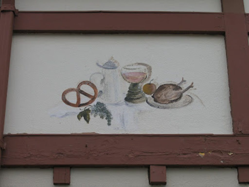 mural of food on the outside of the schnitzelbank restaurant in grand rapids michigan