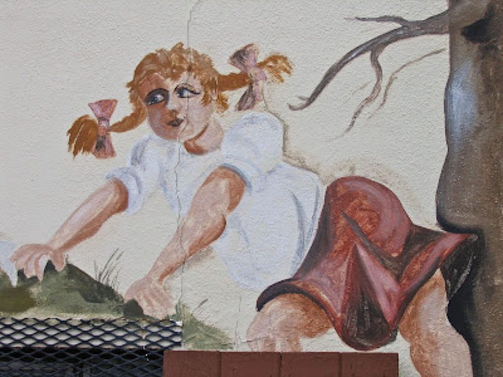 part of a mural on the outside of the schnitzelbank restaurant in grand rapids michigan