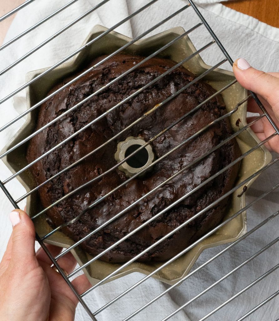 flipping bundt cake out on to cooling rack