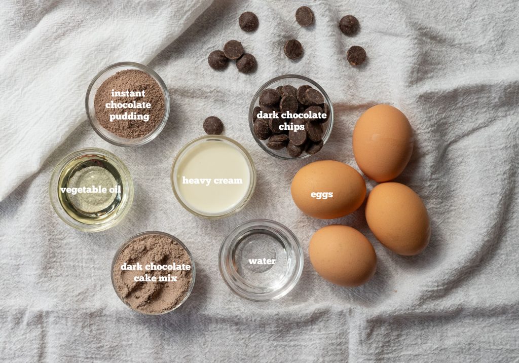 photo of ingredients for triple chocolate bundt cake laid out on a cloth