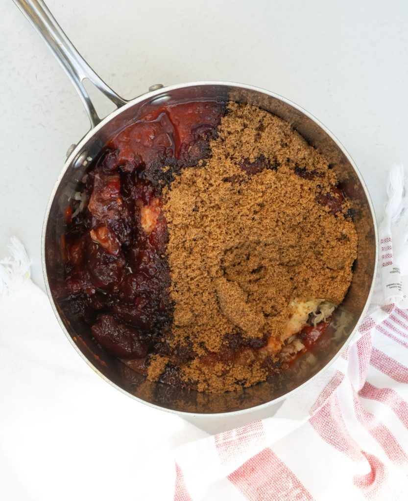 ingredients for cranberry sauce in medium sized saucepan