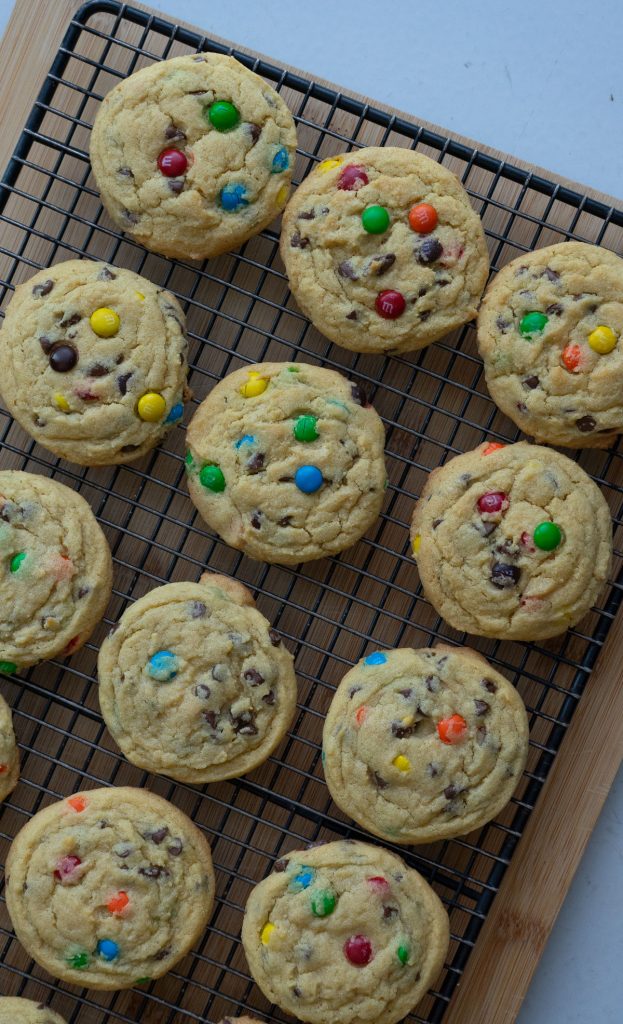 soft and chewy chocolate chip cookies on a baking rack 