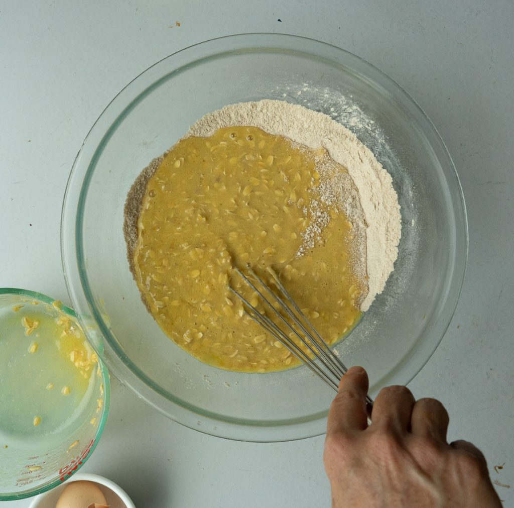 mixing ingredients in a glass bowl 