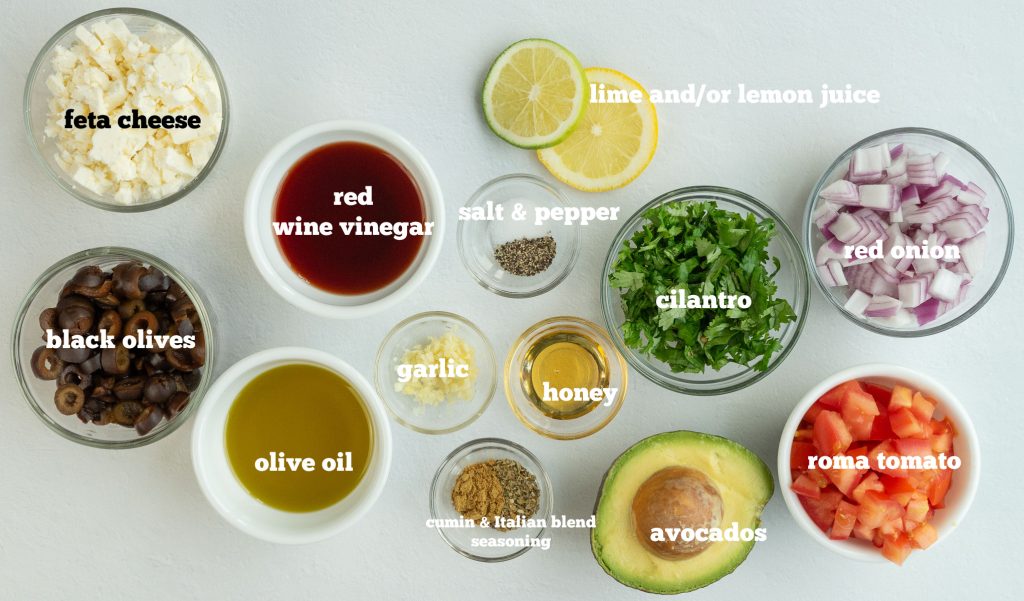 ingredient picture for greek guacamole on a gray counter top