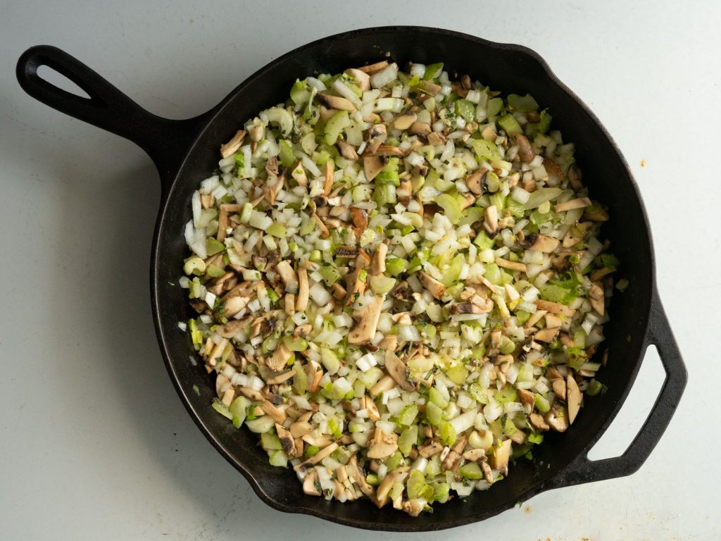 vegetables cooking in skillet for thanksgiving stuffing 