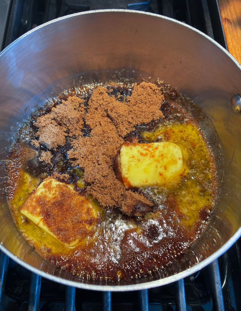 butter,brown sugar, karo syrup, and molasses in a stainless steal saucepan