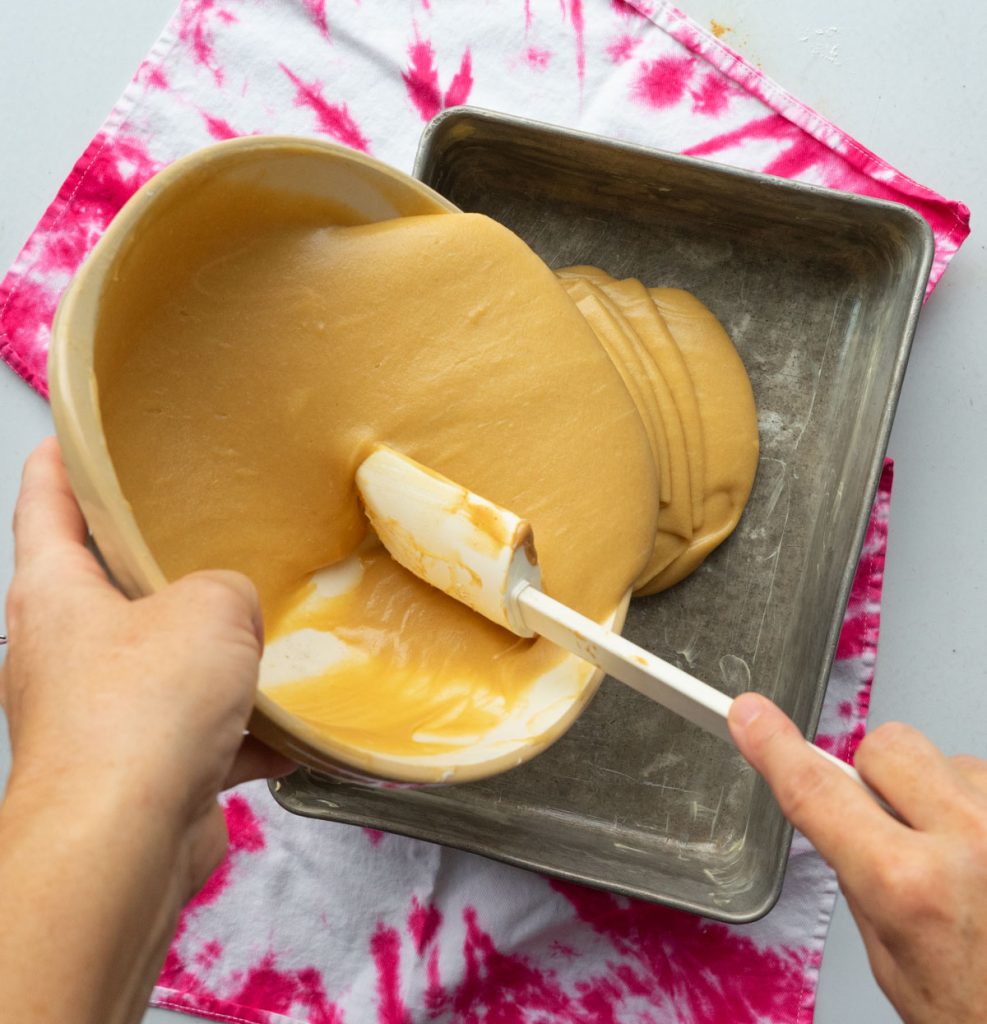 pouring batter into 9x13 cake pan